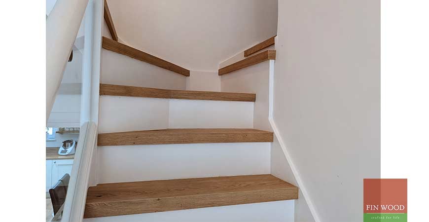 Engineered oak stair cladding with modern white painted risers uplifts a semi-detached family home, Epping Forest #CraftedForLife